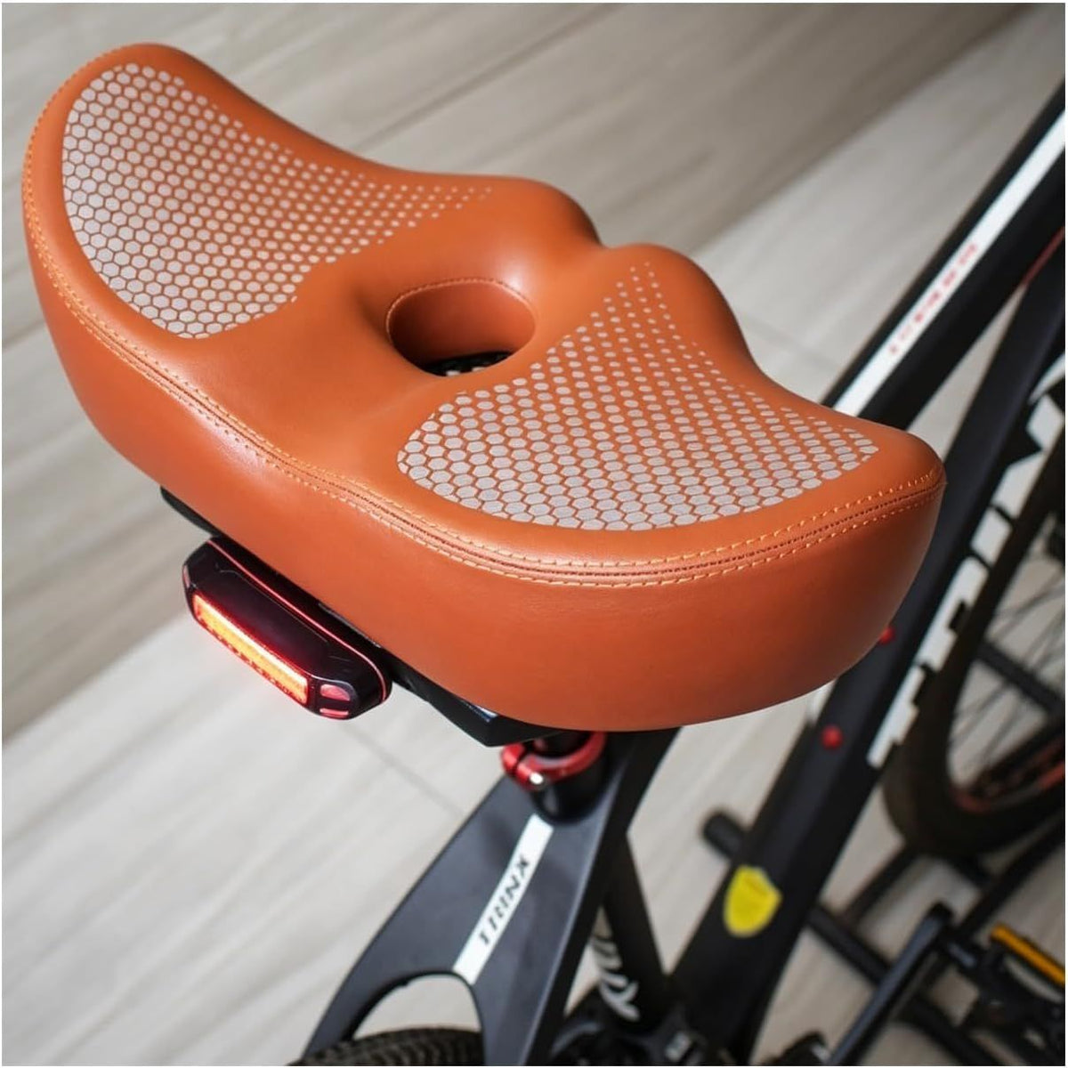 Noseless Bike Seat Wide,Padded Bike Seat for Men and Women,Bike Accessories
Memory Foam Padding Dual Shock Balls and Center Vent for Mountain Bike Exercise Bike Electric Bike(Black)