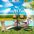 Vertical multi-arm mist cooling system, 360° surround atomization, brass anti-clog nozzles, 8m tubing, no electricity needed—connects to faucet and sprays instantly, supports multi-sprinkler series connection, ideal for patio, garden, and outdoor cooling.