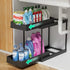 BLACK Two-tier pull-out storage rack. An organizational lifesaver for under the kitchen sink. Features adjustable shelves for easy storage of bottles and jars. In a sleek, modern design. Perfect as a kitchen shelf, bathroom organizer, or household storage