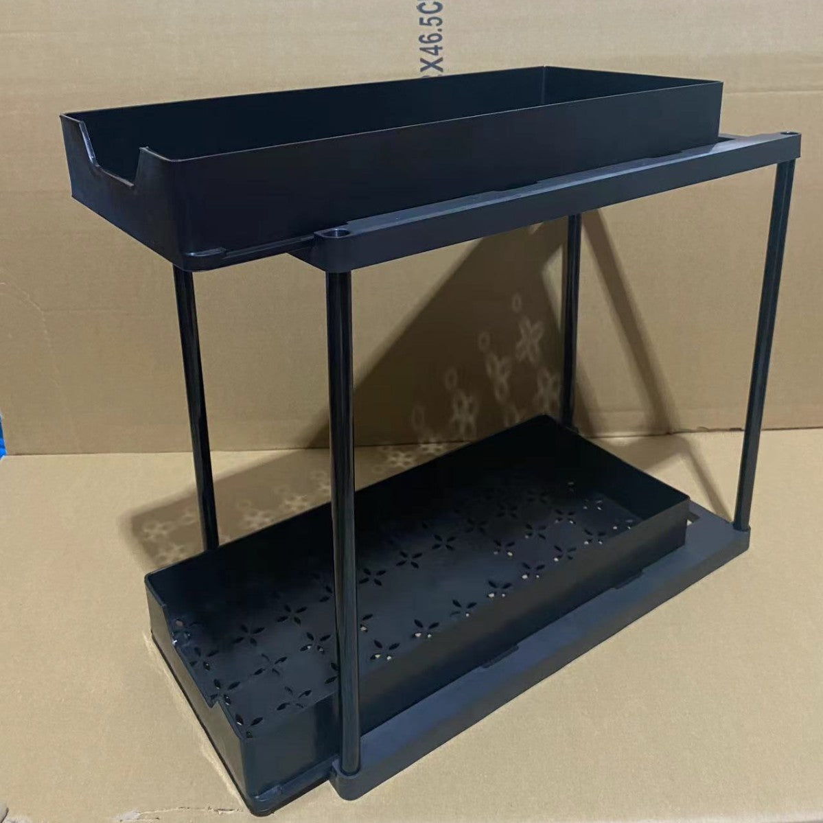 Two-tier pull-out storage rack. An organizational lifesaver for under the kitchen sink. Features adjustable shelves for easy storage of bottles and jars. In a sleek, modern design. Perfect as a kitchen shelf, bathroom organizer, or household storage(WHITE