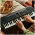 Black 44 Key Portable Mini Keyboard with 100 Tones, 50 Rhythms, and Headphone Output