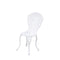 White chair with intricate back design on a white background