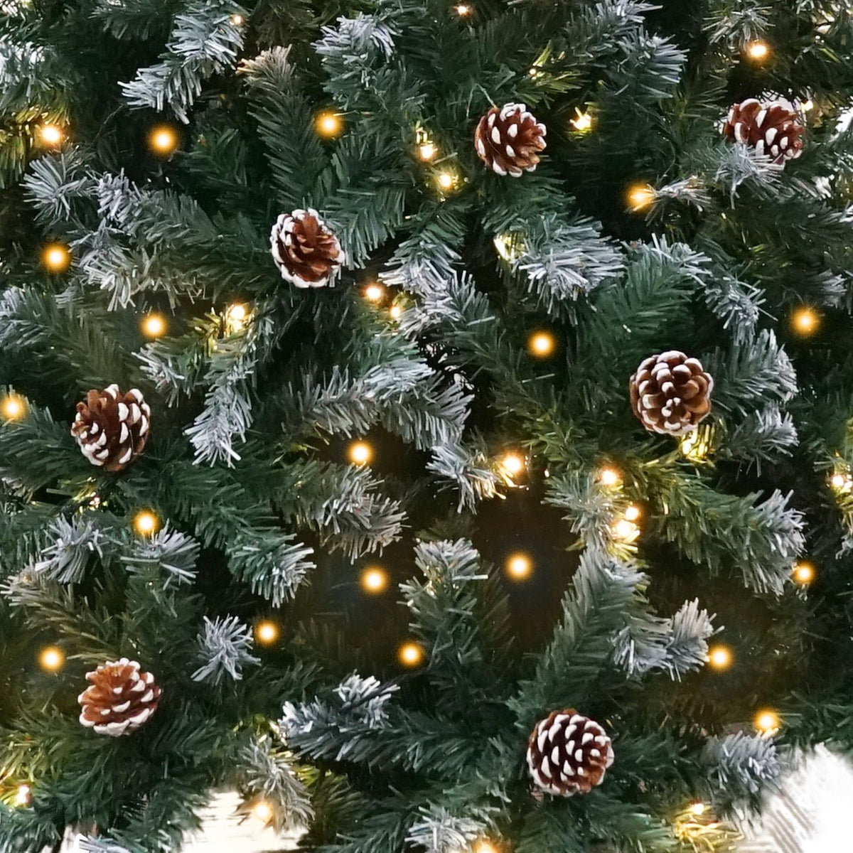 Christabelle 1.5m Pre-Lit LED Artificial Christmas Tree with Snow Tipped Needles Pine Cones Stand