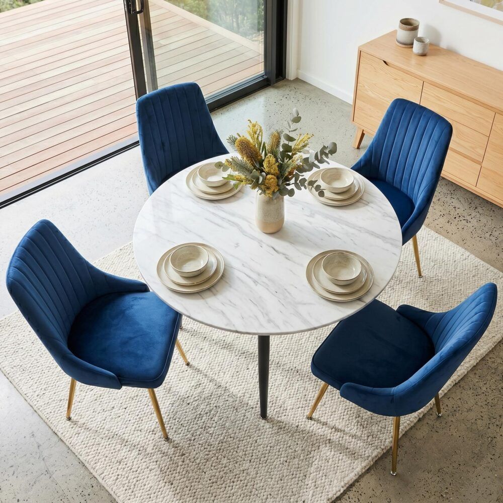 Velvet Dining Set – 4 Blue Chairs & White Round Marble‑Effect Table