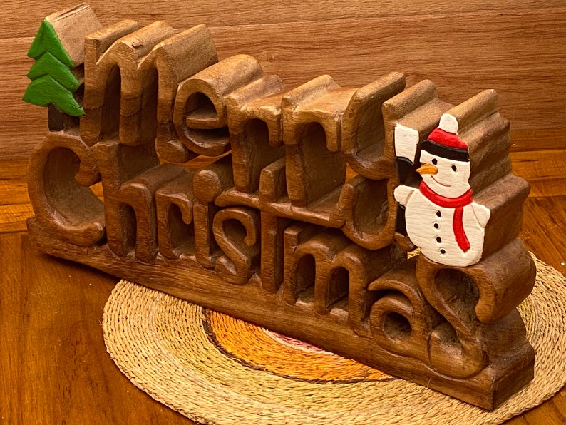 Wooden carved Merry Christmas decoration 38 cm long with Tree and Star