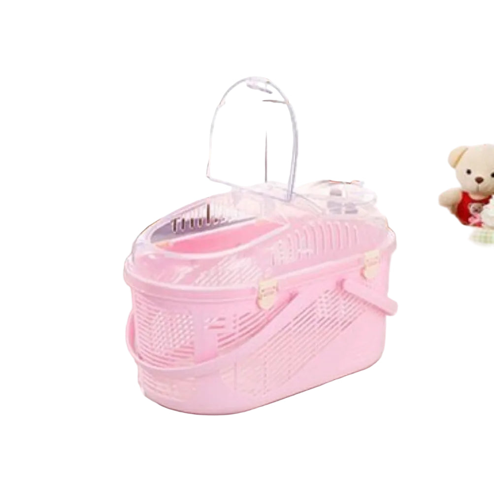Pink baby booties in a clear plastic bag on a light wooden floor with decorative items.