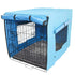 Pet crate with a blue cover on a white background