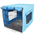 Pet cage with a blue cover on a white background