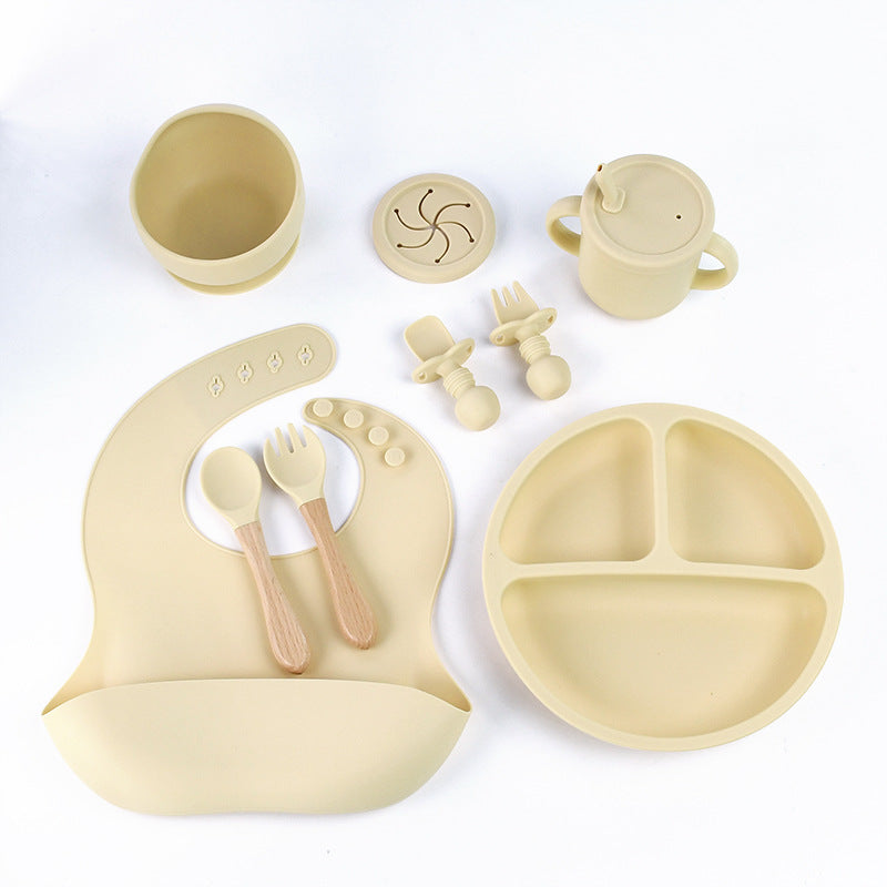 Beige 8-Piece Silicone Children's Tableware Set - BPA-Free Baby Feeding Utensils with Wooden Fork and Spoon, Cup, Bowl, and Bibs