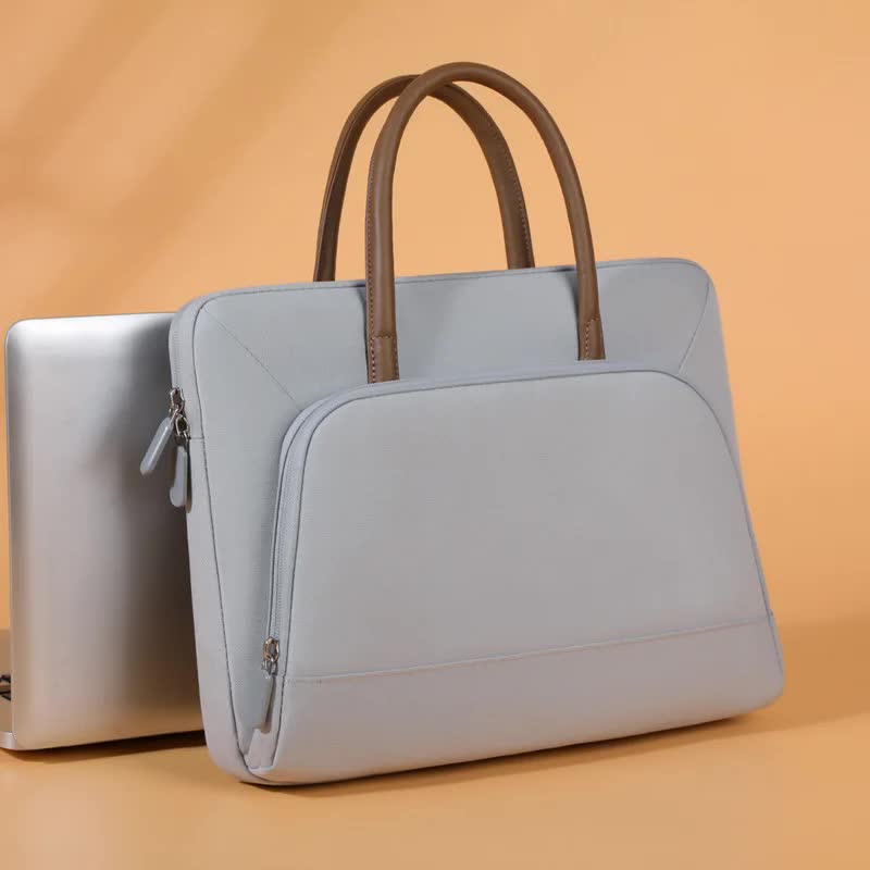 Grey Simple & Stylish Laptop Bag  Elegant Notebook Carrier for Students, Professionals, and Gift Purposes