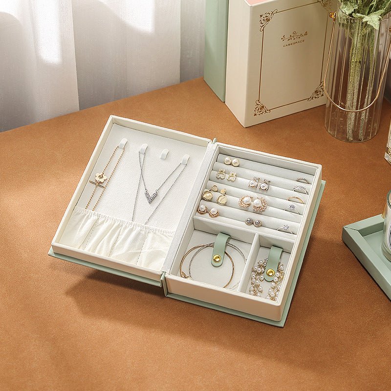 Light Green Creative PU Jewelry Storage Book - Magnetic Closure Organizer for Earrings, Rings, and NecklacesThe Jewelry is a prop for the photo shoot and is not included