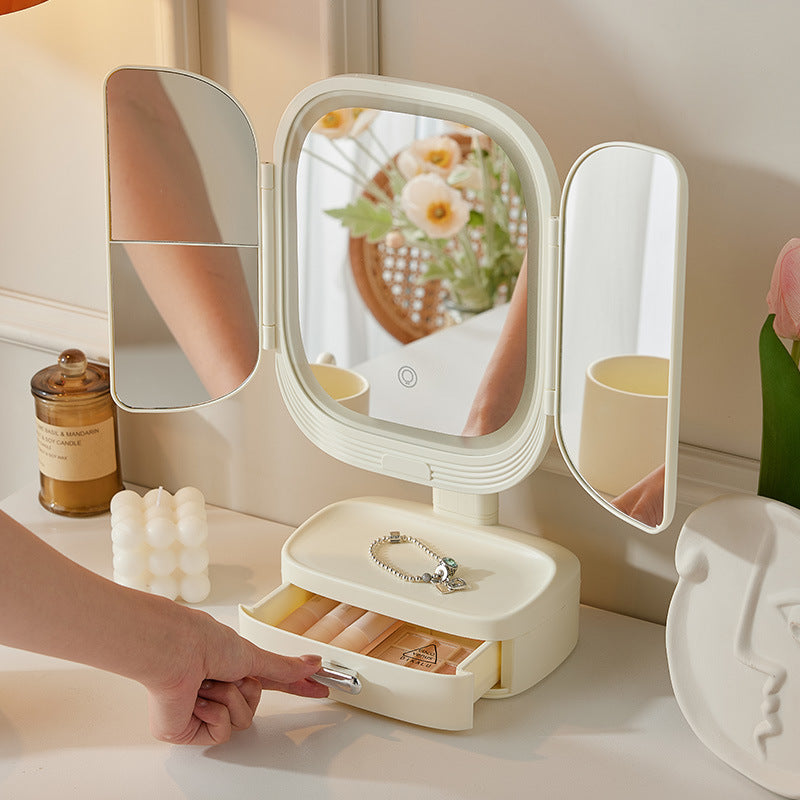 Pink LED Lighted Tri-Fold Makeup Mirror with Storage Drawer & MagnificationUSB Charging Port