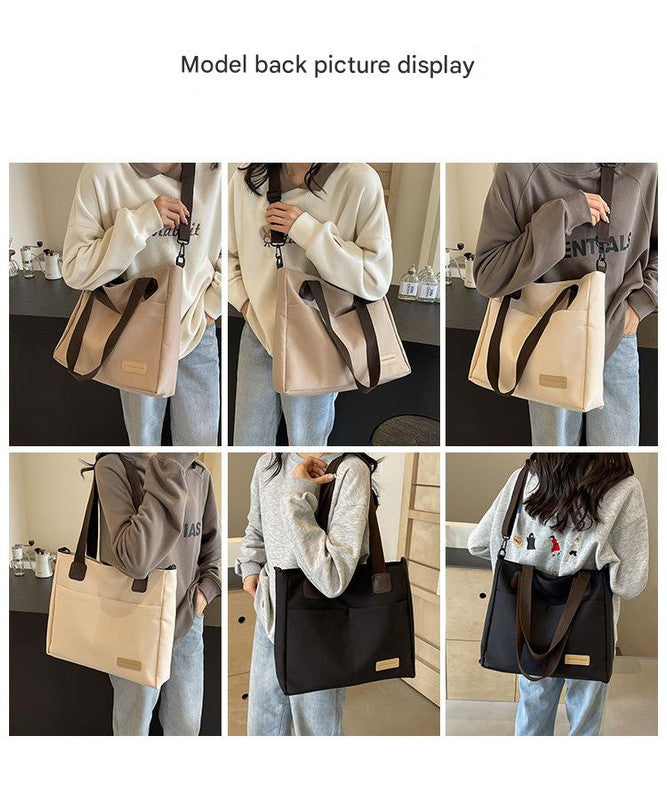 Stylish white canvas tote bag with detachable shoulder strap