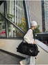 Black Unisex Travel Bag with Utility Buckles and Wet/Dry Compartments