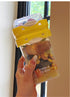 Yellow Portable salad cup with ingredient compartment and fork and spoon - enjoy breakfast on the go