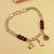 Gold-Tone Chain Bracelet with Red and Black Beads, Elephant Charm, Feather Pendant, and Round Stone Accent – 19 cm Length