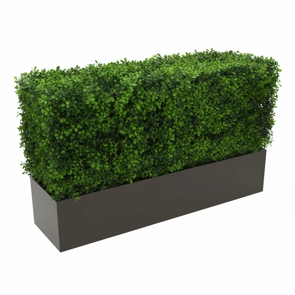 Artificial green hedge in a rectangular planter box
