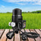 Automatic water pump pressure controller with gauge and plug on wooden surface outdoors